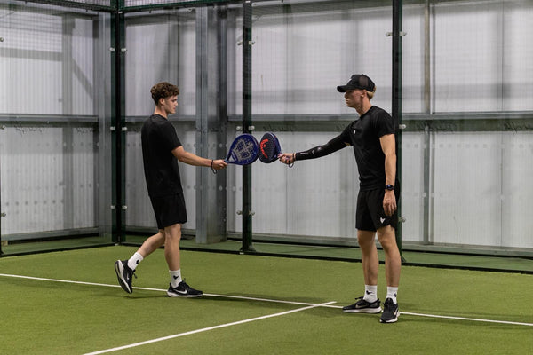 2 padel athletes wearing padel clothes