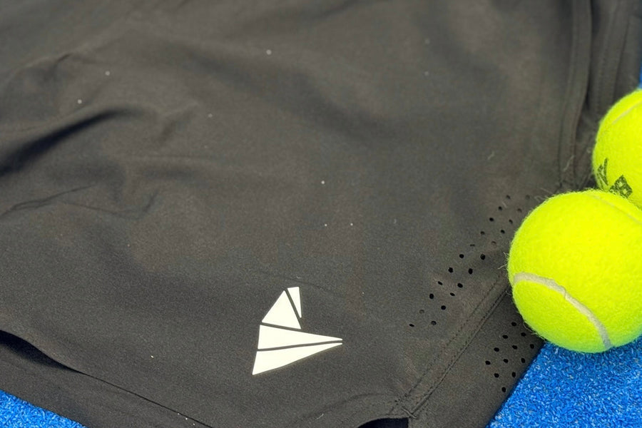 Padel player wearing Padel Source Pro Performance Shorts